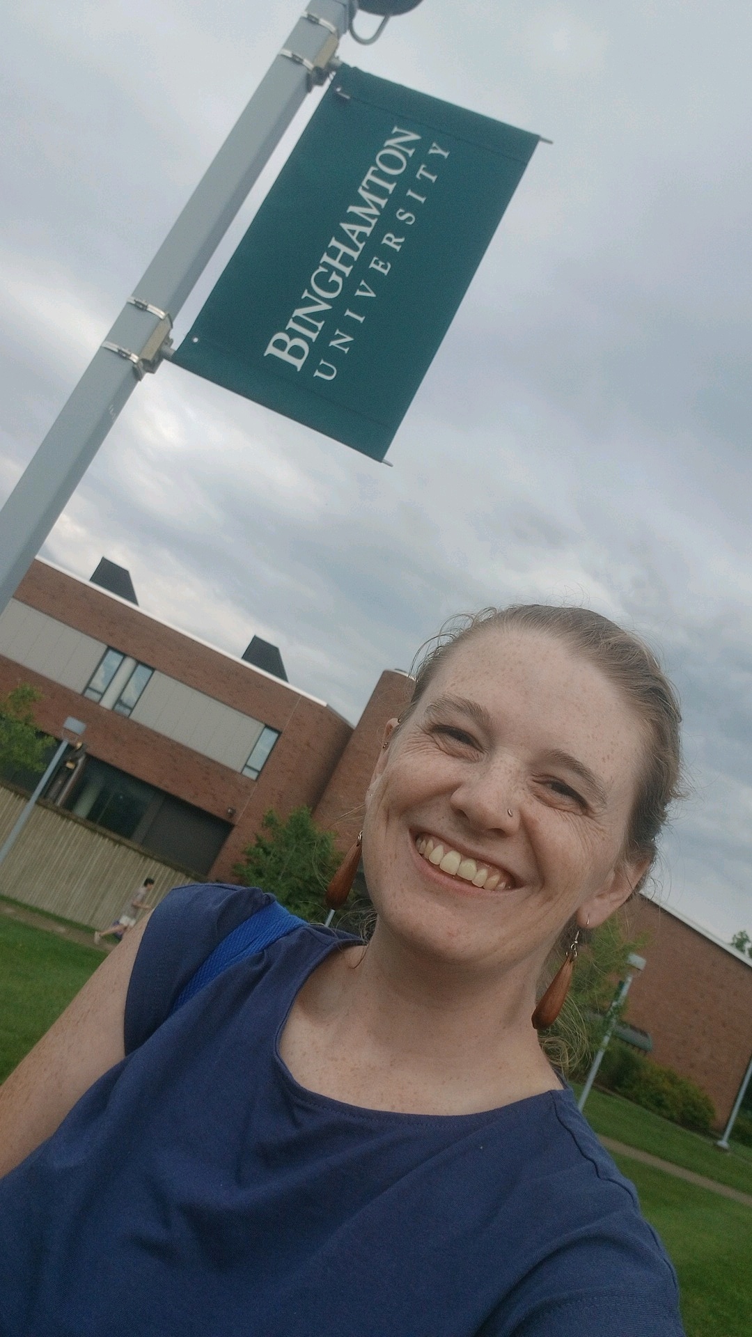 Lyn Watts in front of Binghamton Banner